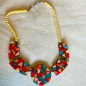 Wooden beaded necklace with large painted pieces. Very pretty and quirky.